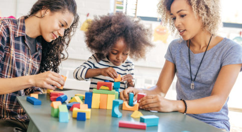 caretakers with child